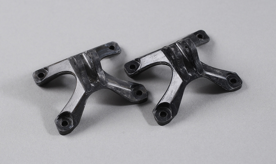 Additive Molding technology allows Arris to run continuous fiber around the holes in strong, durable brackets. 