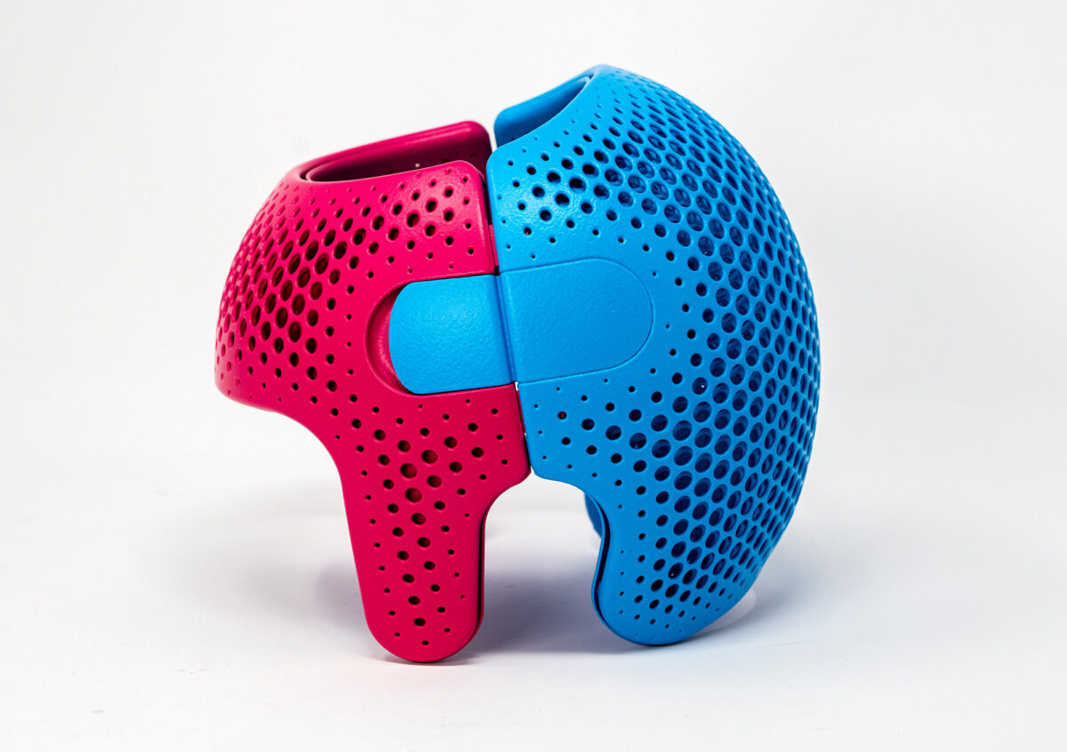 DyeMansion’s DeepDye Coloring post-process capability is shown on a white polyamide 12 part made on an HP Jet Fusion 5420W printer. The colored part is a cranial helmet.