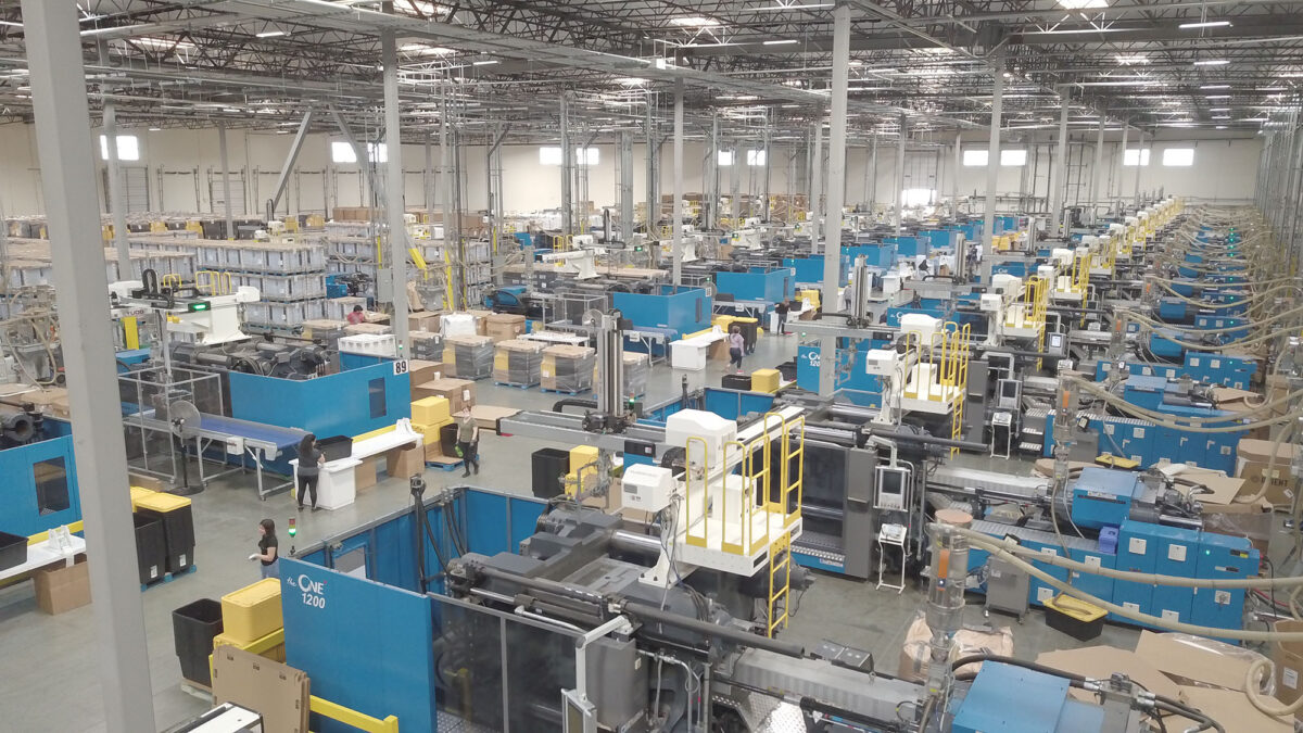 Overhead shot shows an array of LS Mtron injection machines at a US Merchants plant in Ontario, Calif.