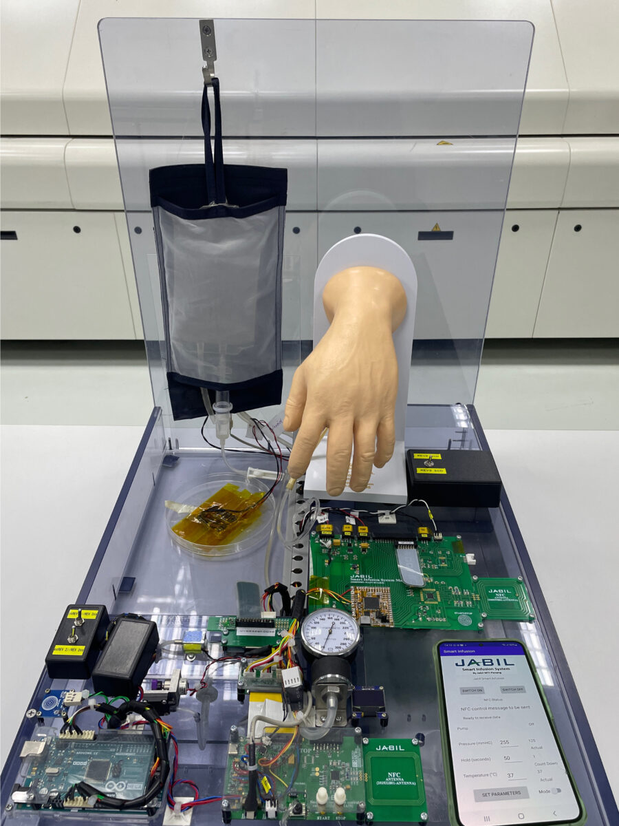 Prototype of the Jabil-MTI Penang smart infusion system, which includes a low-cost IV fluid bag with an embedded printed sensor powered by artificial intelligence.