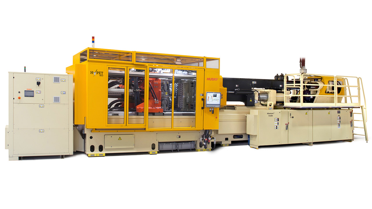 This Husky HyPET 225 injection molding press is representative of the system used to mold PET/F. 