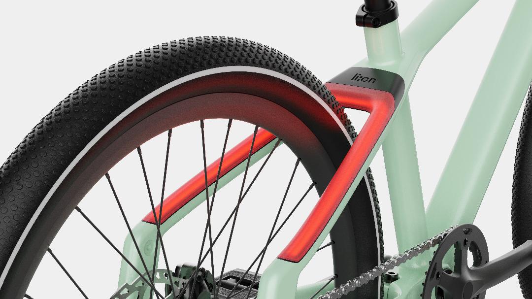 The bike’s design integrates a rear running light for added visibility and safety. 