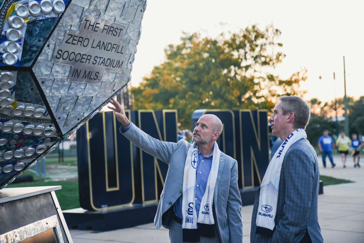 Philadelphia Union President Tim McDermott (left) and Alan Bethke, SVP of marketing for Subaru of America, reveal the “zero landfill” sculpture at Subaru Park in Chester, Pa., on Oct. 4.