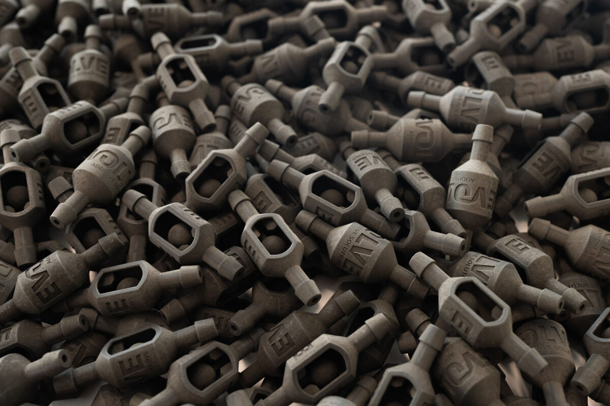 Production-scale check valves printed using Evolve’s gray ABS resin.