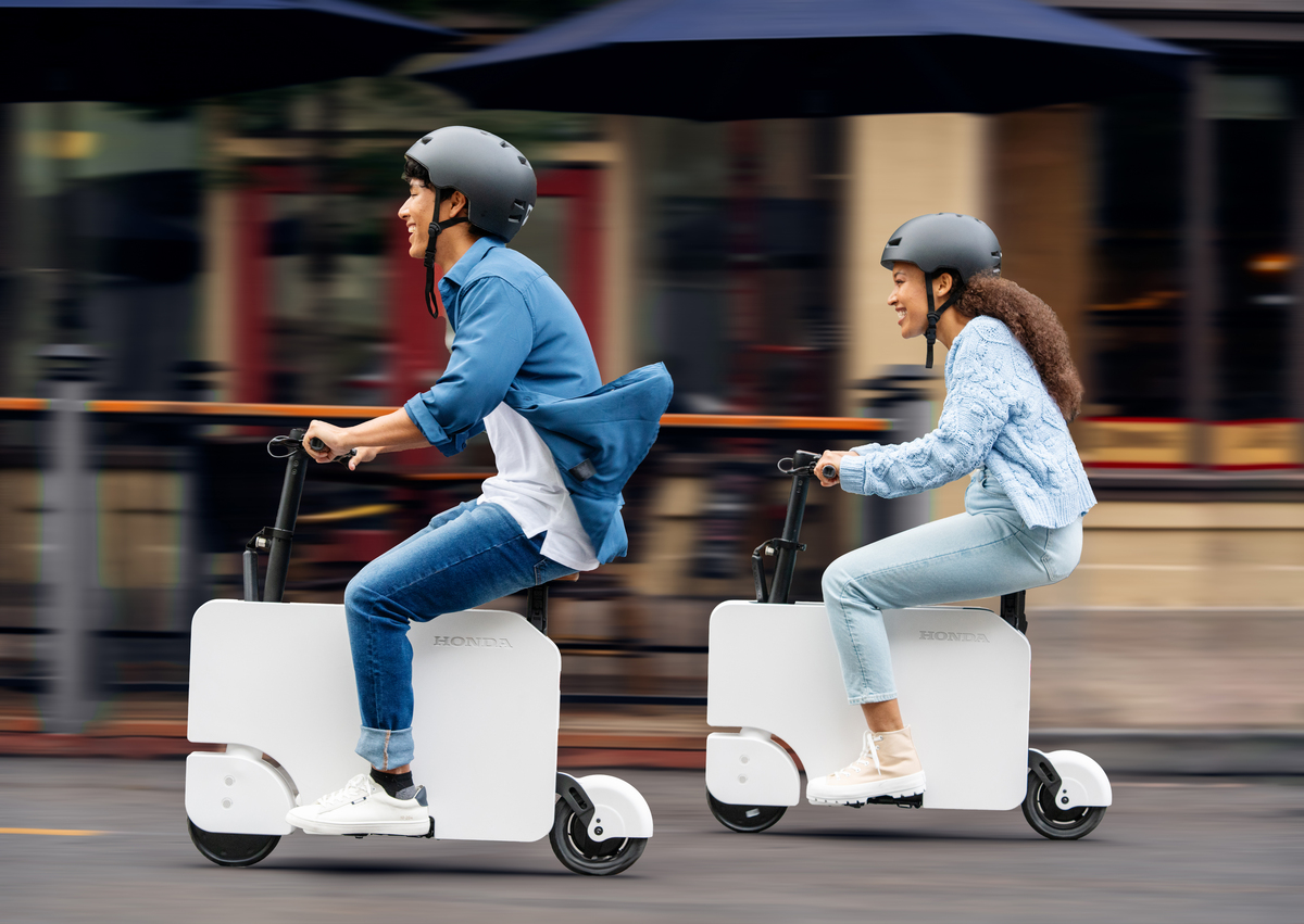 The Honda Motocompacto electric scooter can go 15 mph and has a 12-mile range.