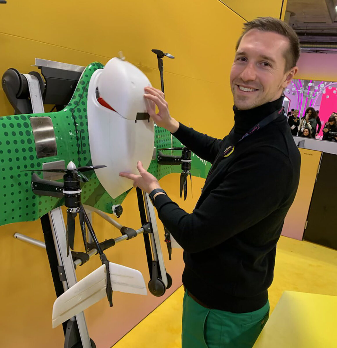 Jedsy’s Christian Bredemeier displays his company’s medical delivery drone on the Swiss pavilion at CES 2024.