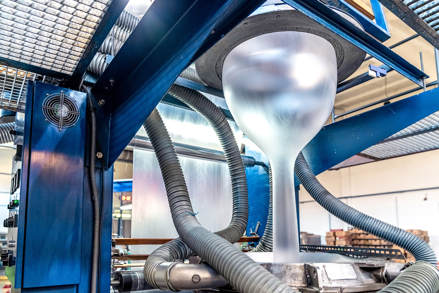 Blowing plastic on a machine into a roll for the production of plastic bags