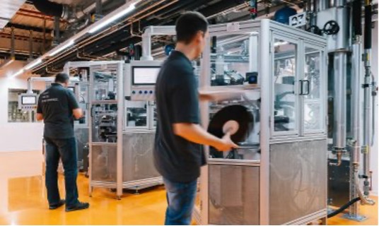 Optimal Media in Germany manufactures more than 100,000 discs every day with what it calls “its tuned classics and impressive collection of new pressing machines.” Optimal Media GmbH photo. 