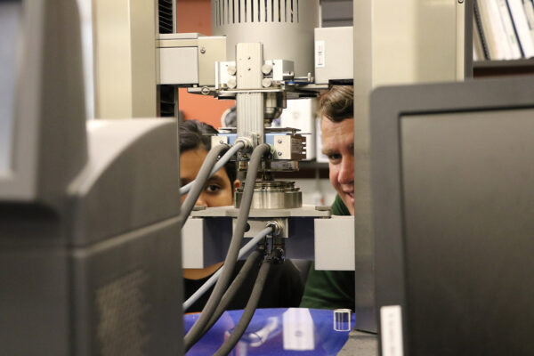 Baylor University’s David Jack (right) assesses the column of a MARS 40 rheometer with student Rifat Nargis.