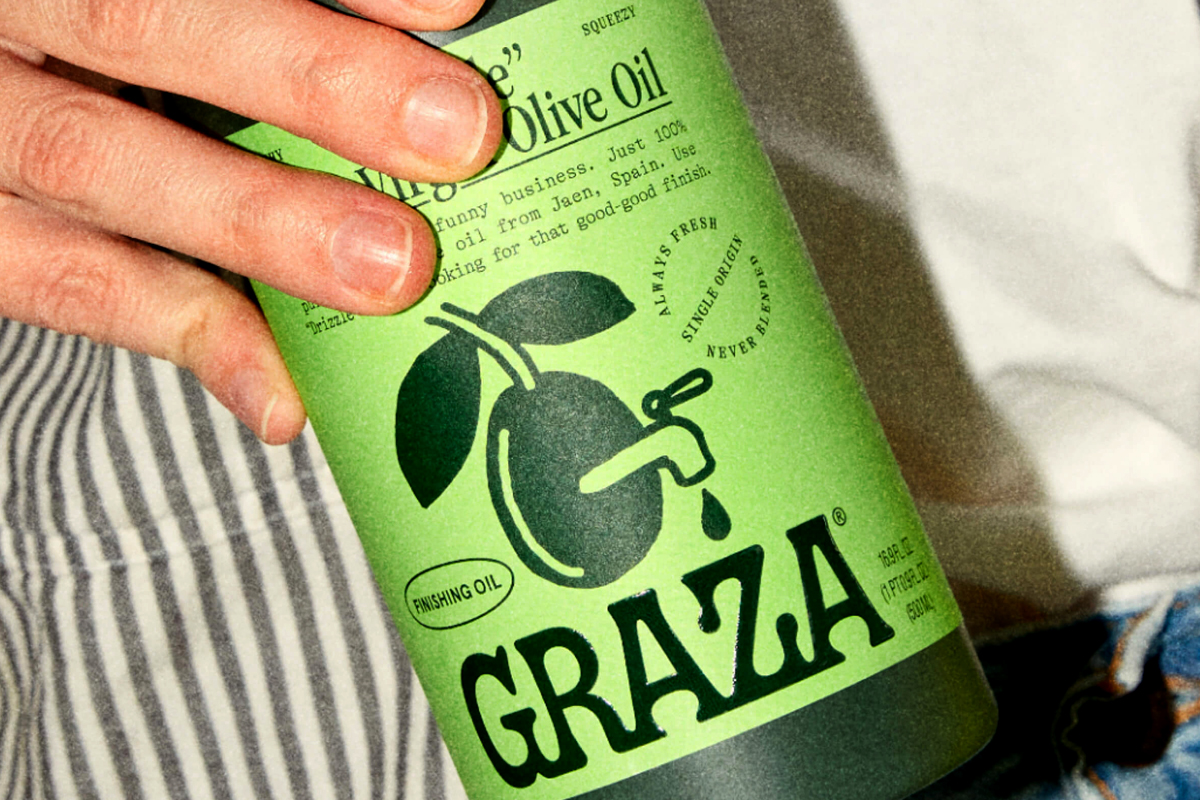 Graza's olive oil embraces anti-conventional packaging with a squeeze bottle format and electric green label featuring typewriter-style text and hand-drawn illustrations. The design deliberately rejects premium olive oil category. Design by Gander.