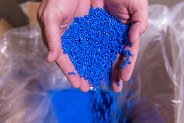 Closed-loop material handling and energy-efficient molding systems at Accudyn, aligned with ISO 14001 environmental management standards. (Photo courtesy of Accudyn Products Inc.)