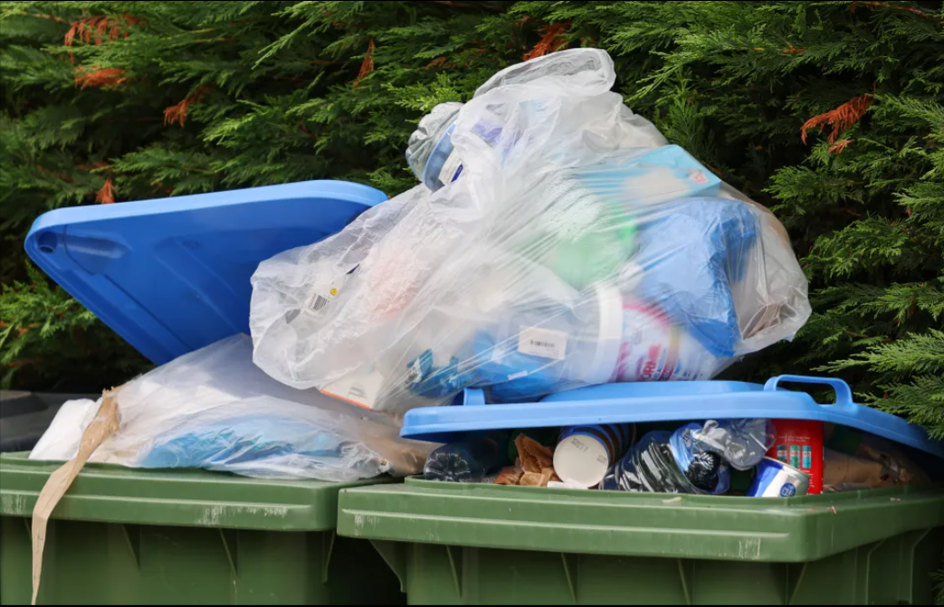 UK residents claim that carefully separated rubbish is mixed together into one big bin. Courtesy of Gary Stone.