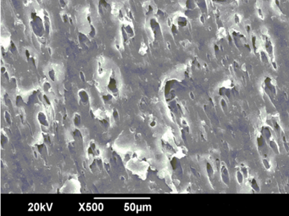 Adding 4% of the PP-g-MAH compatibilizer to the blend significantly improves the dispersion of the recycled PET particles, reducing their size to a much smaller 9–12µm. This confirms that the compatibilizer successfully reduces immiscibility. Courtesy of Properties of Blends from Polypropylene and Recycled Polyethylene Terephthalate using a Compatibilizer.