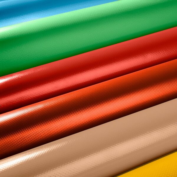 PVC-coated technical textiles in multiple color formulations exhibit a controlled surface texture, a weldable finish, and flexibility suitable for apparel, signage, and protective outerwear applications. Courtesy of Sioline.