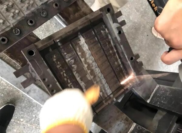 Laser cleaning removes polymer residues from mold cavities without damaging textured steel surfaces. Courtesy of Moz Laser.