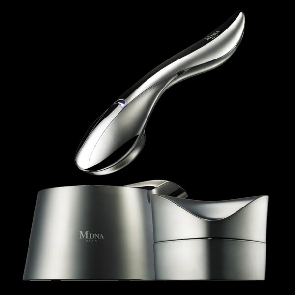 MDNA Skin packaging with glossy black surfaces and metallic finishes demonstrating architectural luxury aesthetics.