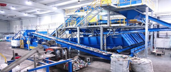 Before a single pellet leaves the facility, post-consumer plastic must run a gauntlet of sorting, washing, and compounding equipment, a process that accounts for the bulk of recycled resin's price premium. Courtesy of Bezner.