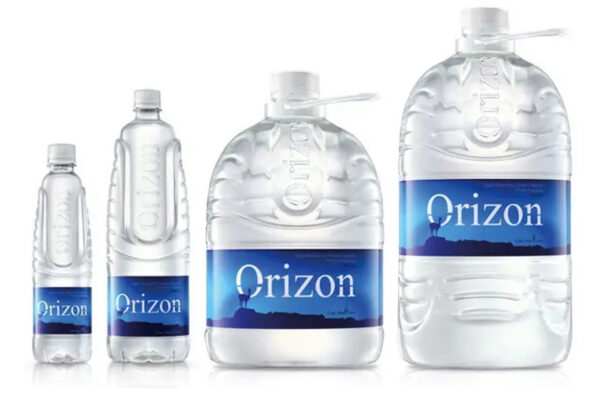 Orizon's bespoke PET bottle features a structural design that wraps around the product with a protective, enclosing gesture, evoking the idea of a hidden treasure emerging from deep Patagonian springs. The form language communicates preciousness and origin through tactile cues engineered directly into the container's geometry. Design by Tridimage.