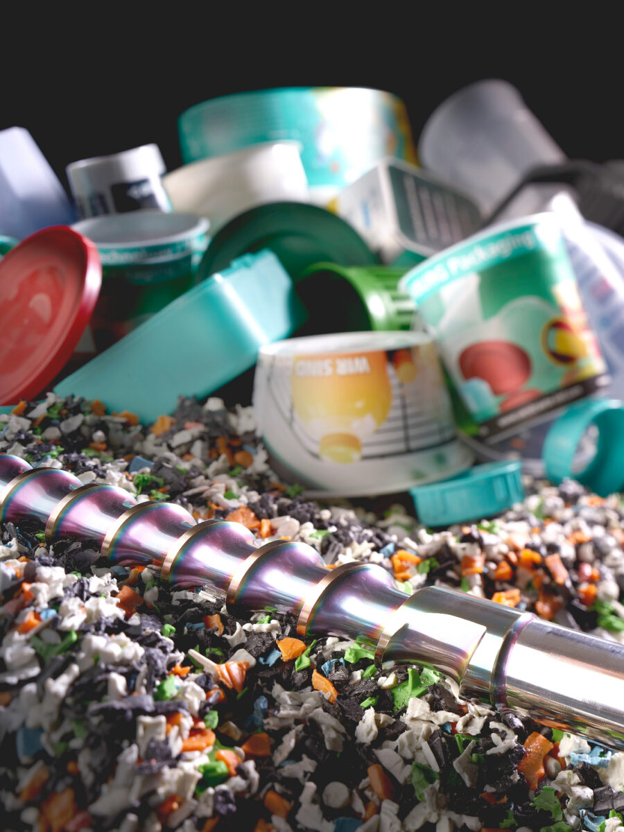Plasticizing screws with modified geometry and a wear-resistant CrN coating are suitable for processing abrasive recyclates. Photo courtesy of Arburg.