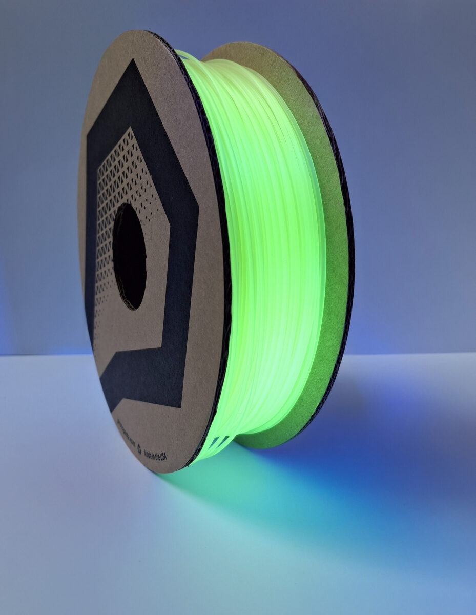 Quantum green filament demonstrates how quantum pigments can deliver intense emissive color in 3D printing materials while preserving polymer processability. Courtesy of Quantum Light.
